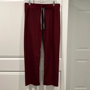 Women Livingston figs scrub bottoms. Small and maroon.